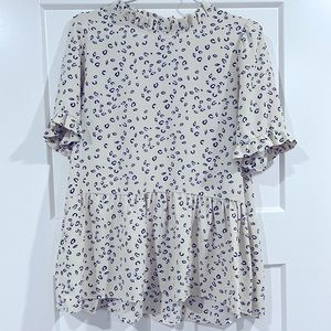 Orange Creek Leopard Peplum Top